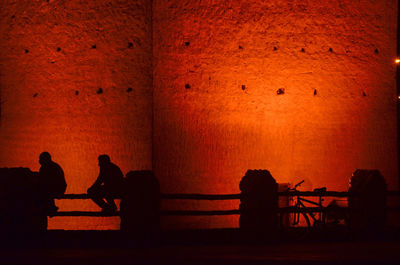 Silhouette people at sunset