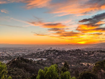 Scenic view of landscape against sky during sunset