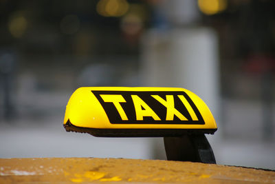 Close-up of yellow sign