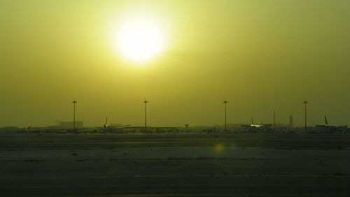 Illuminated lights against sky