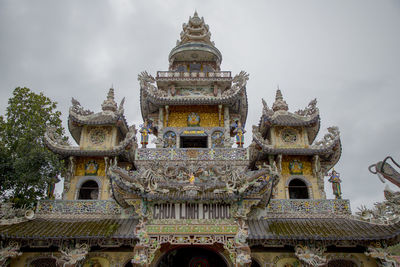 Low angle view of temple building against sky