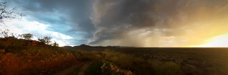 Panoramic view of landscape against sky during sunset