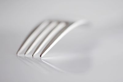 High angle view of fork on table