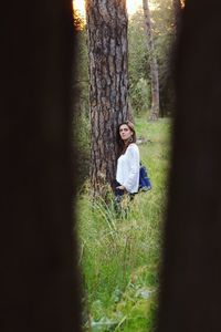 Portrait of woman in forest