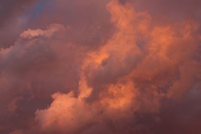 Low angle view of dramatic sky during sunset