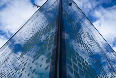 Low angle view of modern building against sky