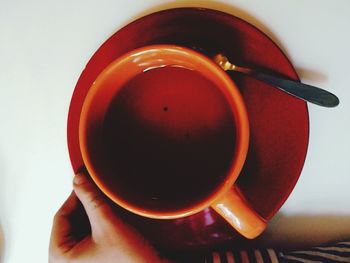 Close-up of hand holding tea