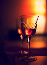 Close-up of wine in glass on table