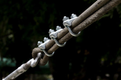 Close-up of rope tied to metal