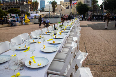 High angle view of empty chairs on street