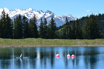 Scenic view of lake against mountain range