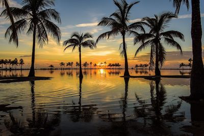 View of calm lake at sunset