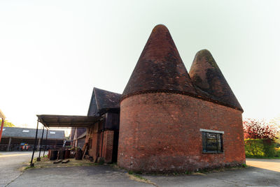 Old abandoned building against clear sky