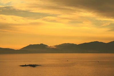 Scenic view of mountains at sunset