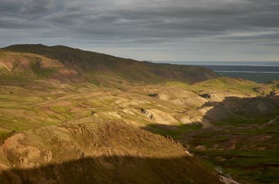 Majestic scenery of highland in sun rays during sunset