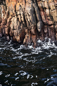 Scenic view of rock formation in sea