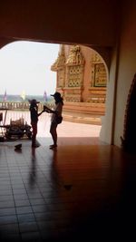 People walking in a temple