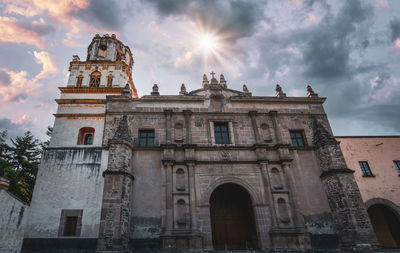 Low angle view of historical building against sky