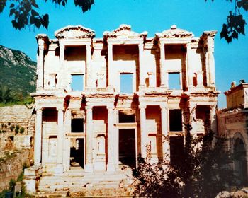 Low angle view of old building against clear sky