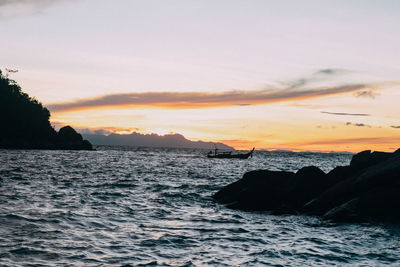 Scenic view of sea against sky at sunset