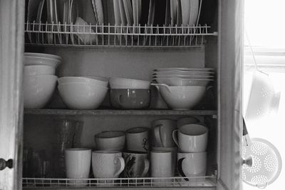 Stack of books in kitchen at home