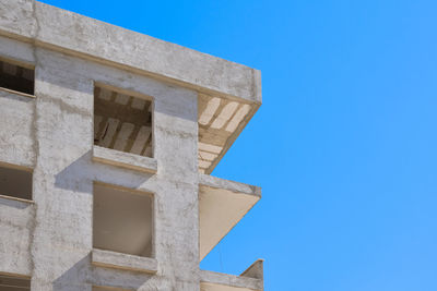 Unfinished multi storey residential building under construction.