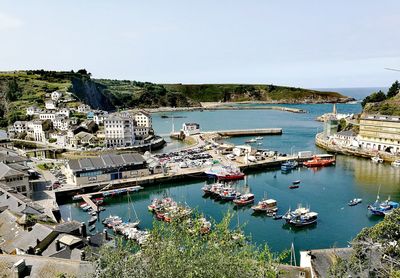 High angle view of boats moored at harbor