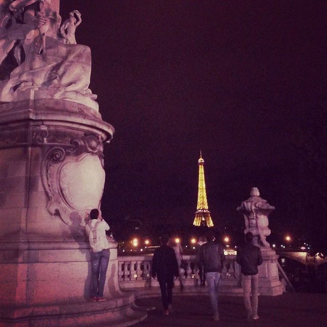 night, illuminated, large group of people, architecture, famous place, built structure, men, person, travel destinations, tourism, religion, building exterior, lifestyles, place of worship, spirituality, travel, leisure activity, international landmark, copy space