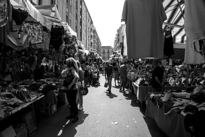 People on street market in city