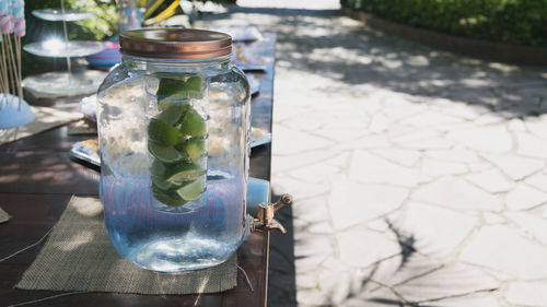 Close-up of glass jar on table