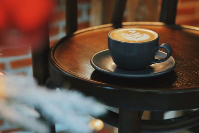 Close-up of cappuccino on table