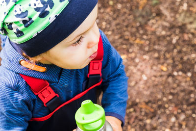 Midsection of boy looking away