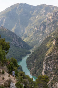 Rear view of man on mountain range