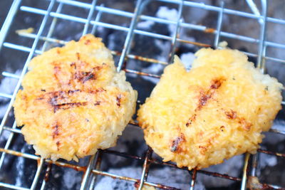 Close-up of meat on barbecue grill