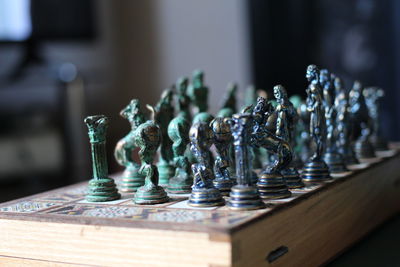 Close-up of chess pieces on book