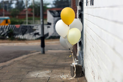 Close-up of balloons on road