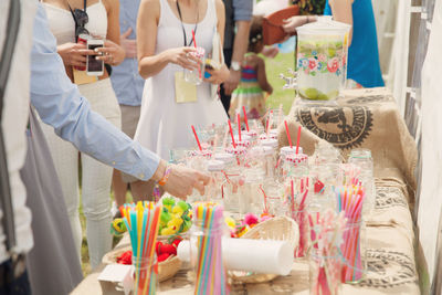 Group of people at market stall