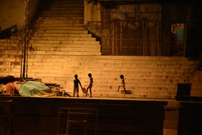 People working on wall