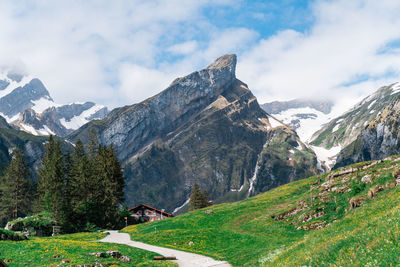 Scenic view of snowcapped mountains against sky