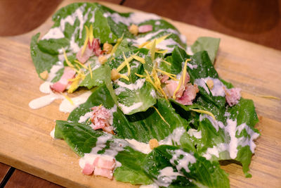 High angle view of chopped vegetables on cutting board