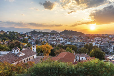 High angle view of townscape against sky at sunset