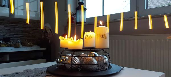 Close-up of illuminated candles