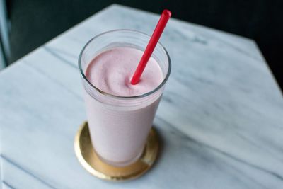 High angle view of drink in glass on table