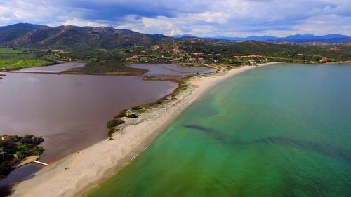 Aerial view of lake against cloudy sky