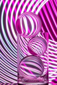 High angle view of multi colored glass on table