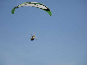 Low angle view of paramotor glider 