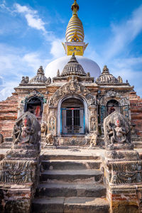 Low angle view of traditional building against sky