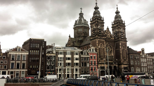 Low angle view of cathedral against cloudy sky