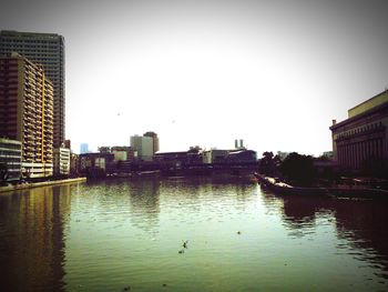 Buildings in distance with waterfront