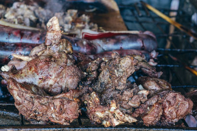 Close-up of meat on barbecue grill